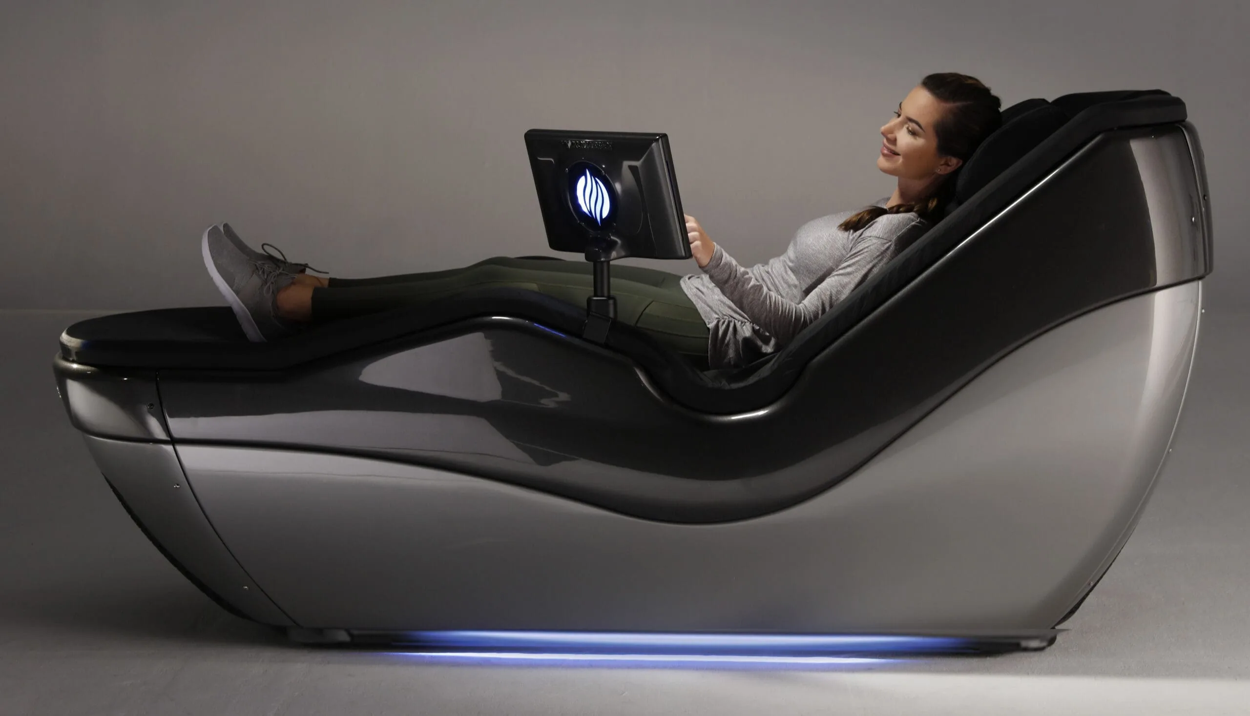 Client relaxing on Hydromassage bed at Revitalize Buford GA